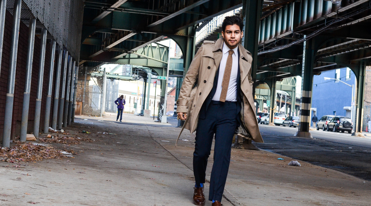 dandy in the bronx trench coat with a navy suit