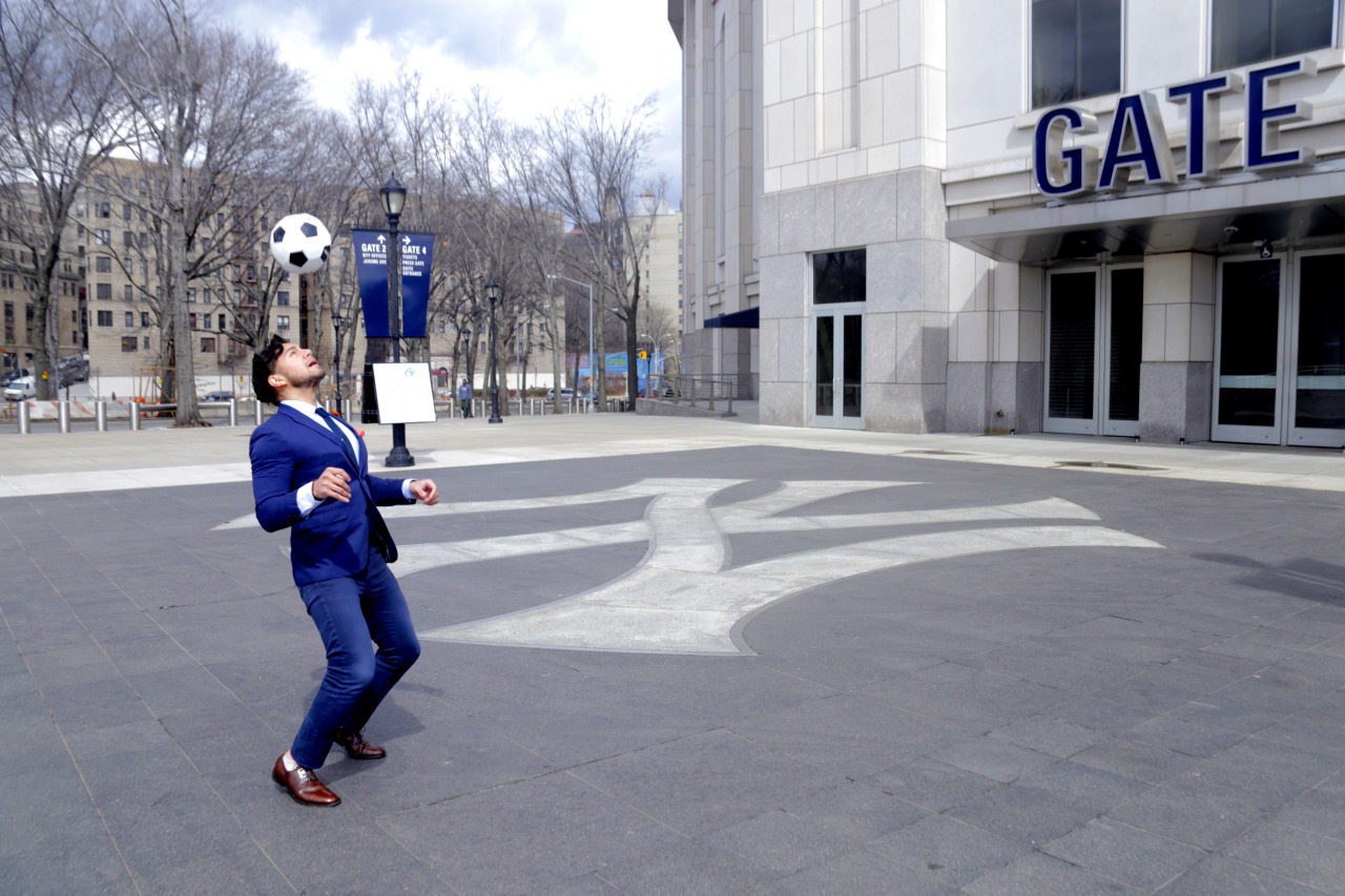 Dandy In The Bronx at Yankee Stadium for NYCFC - menswear suit inspired by nycfc - menswear suit inspired by nycfc navy suit - dandy in the bronx playing soccer in a suit