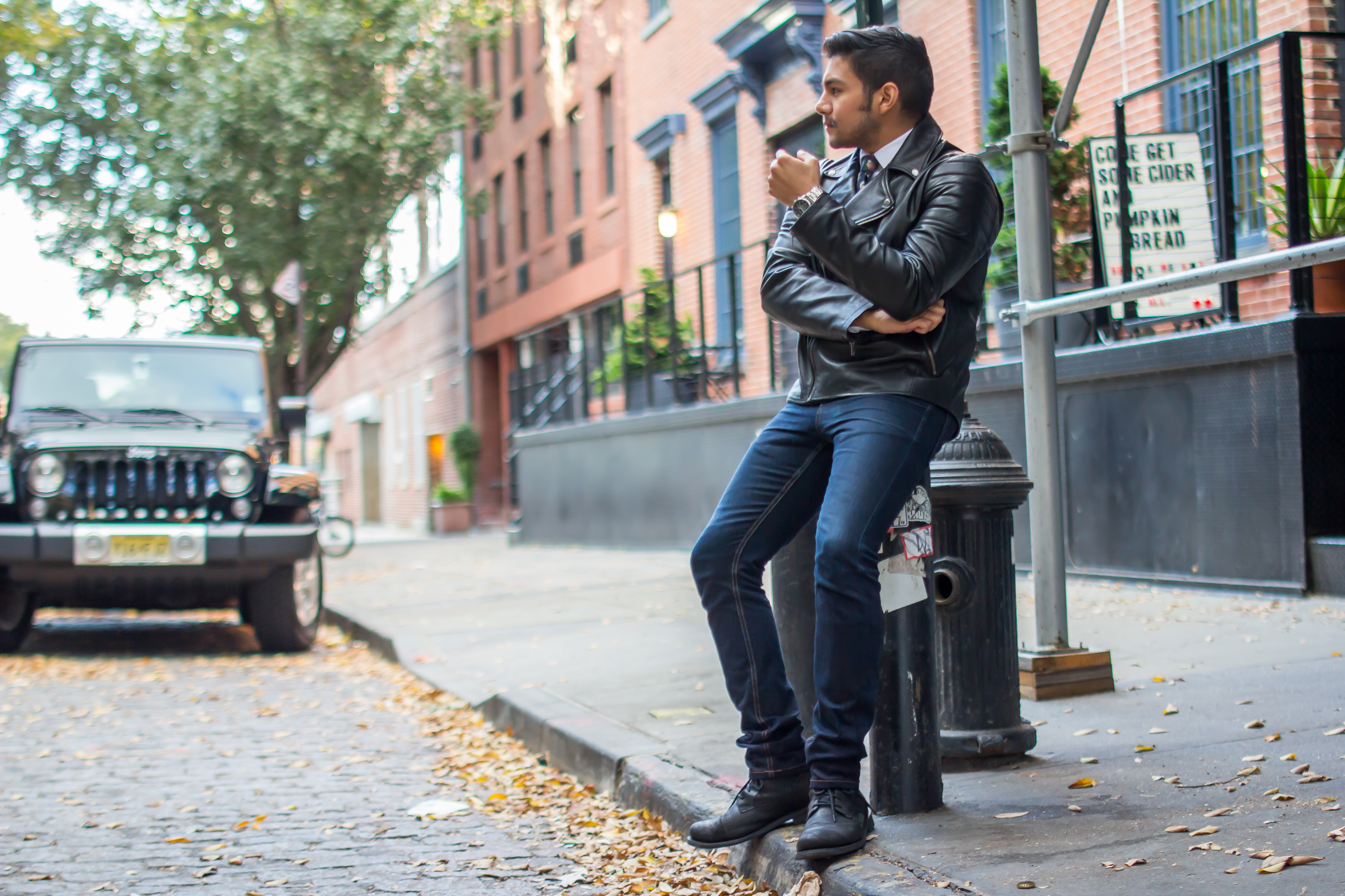 Dapper Leather - wearing a black leather jacket with jeans and boots - dandy in the bronx
