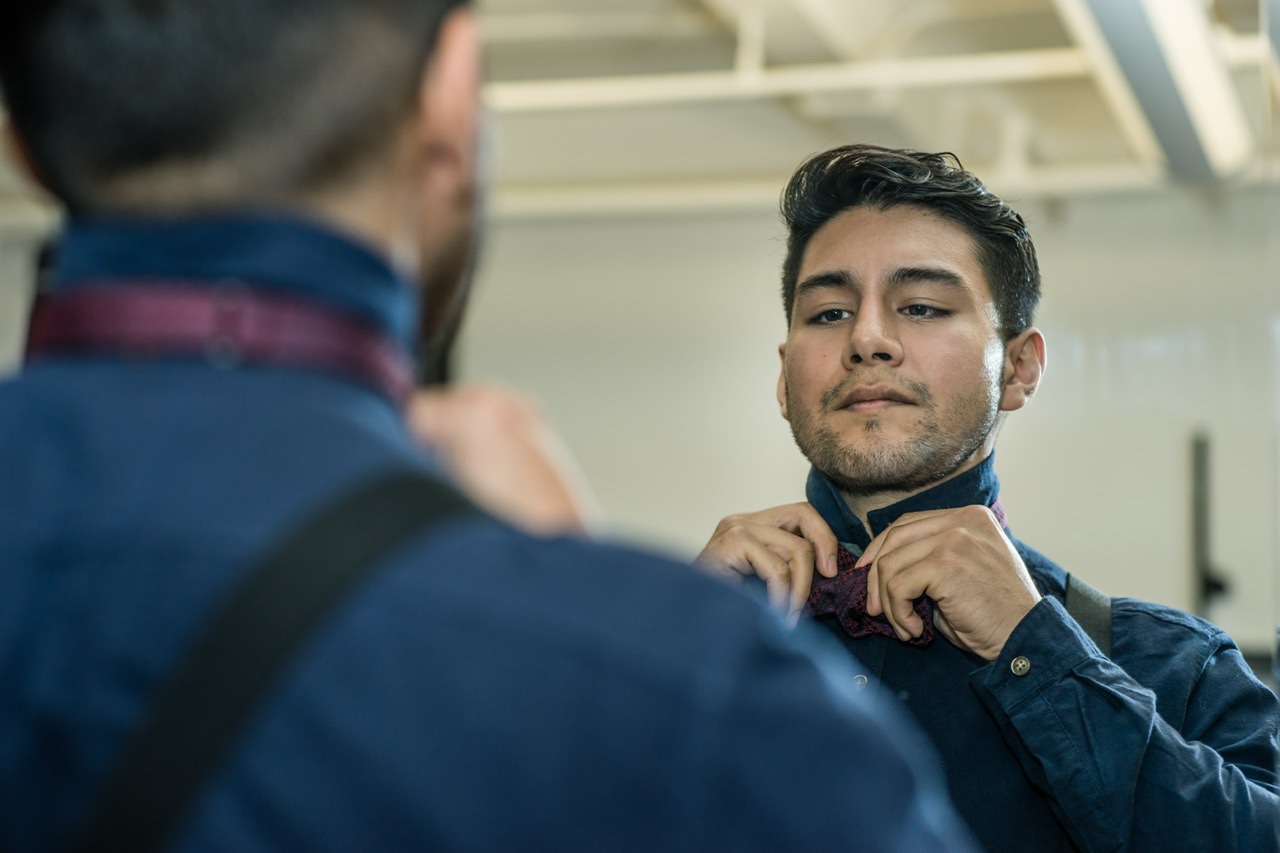 Man tying a tie - dandy in the bronx