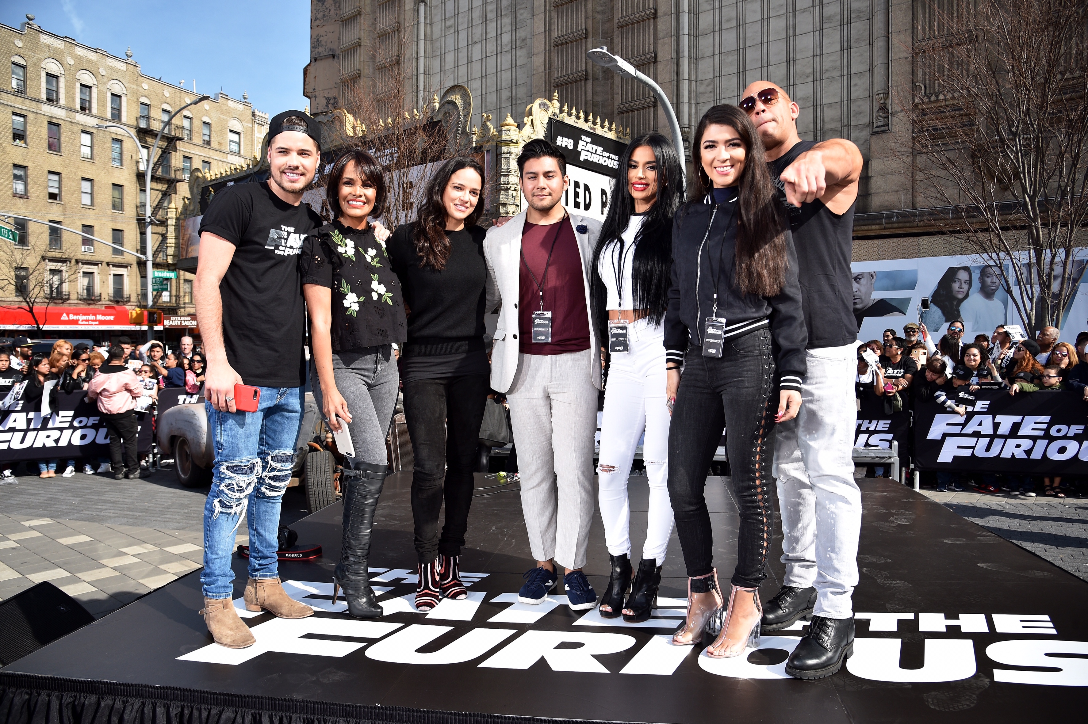 NEW YORK, NY - APRIL 11: William Valdes, Birmania Rios, Carolina Enamorado, and Sherry Maldonado pose with Michelle Rodriguez and Vin Diesel as they visit Washington Heights on behalf of "The Fate Of The Furious" on April 11, 2017 in New York City. (Photo by Kevin Mazur/Getty Images for Universal Pictures)