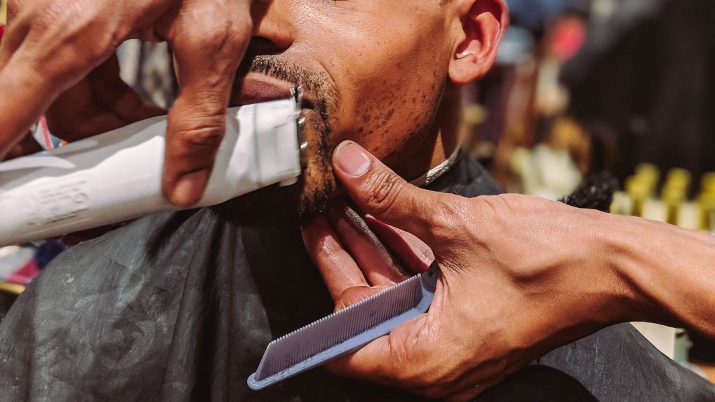 black man at the barber - goatee - man 