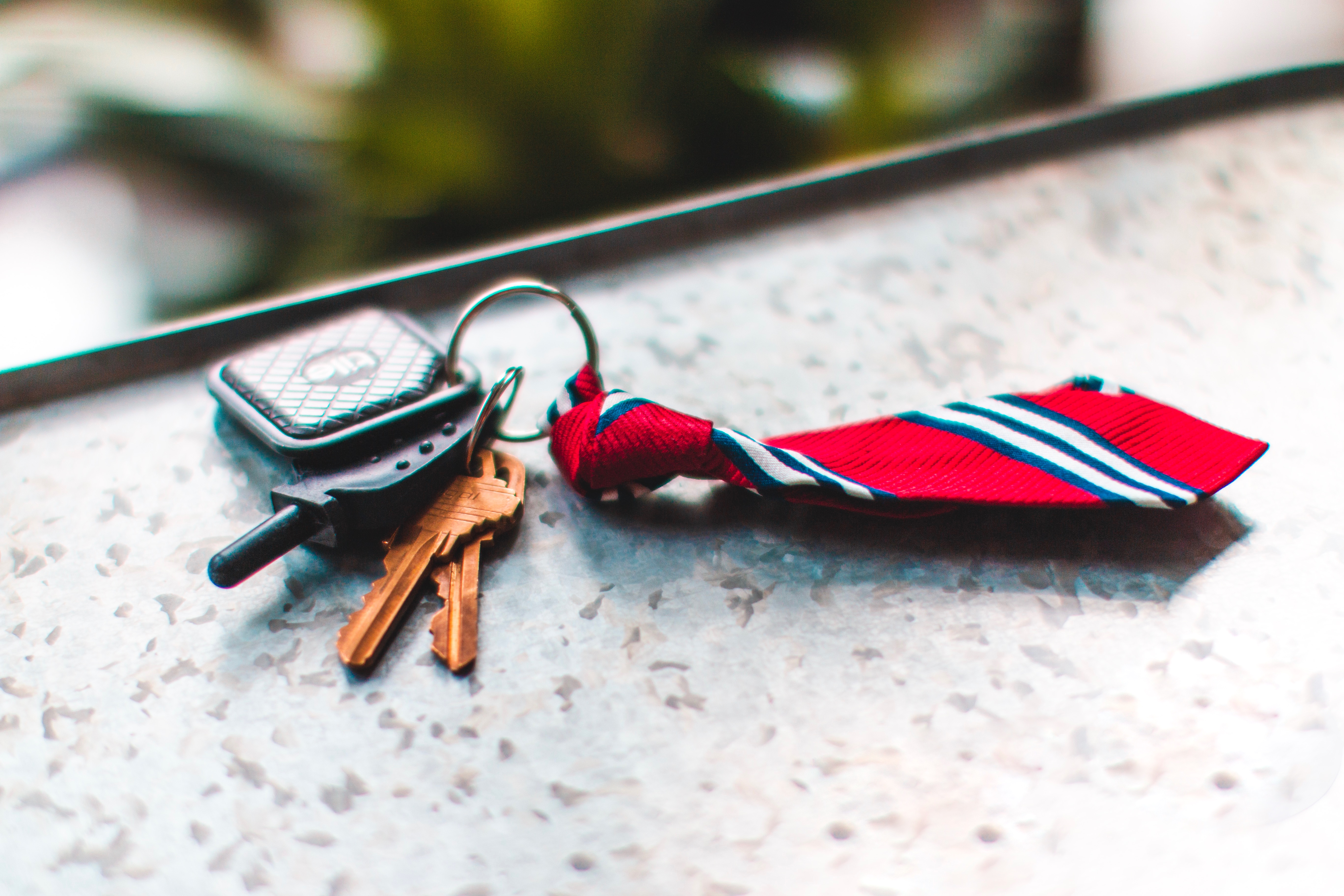 How to Take the Hassle Out of Buying Your Next Car - car keys with a tie key ring chain - dandy in the bronx
