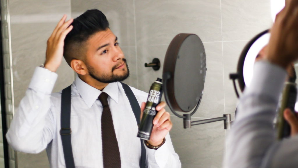 GROOMING TOOLS FOR MEN - MAN USING HAIR SPRAY - DANDY IN THE BRONX - latino