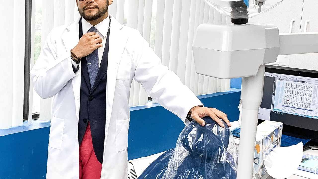 Dentist - man in lab coat - latino dentist - suit and lab coat - dandy in the bronx