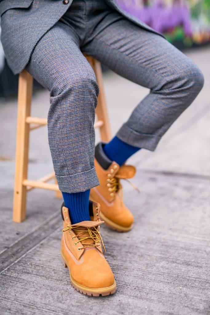 HOW TO PAIR UP YOUR TIMBERLAND BOOTS WITH A SUIT - how to wear timbs with a suit - timberland boots with suit - boots with suit - classic timberland boots - dandy in the bronx - marc darcy suit - turtleneck with suit - blue socks - dapper timberland boots - 