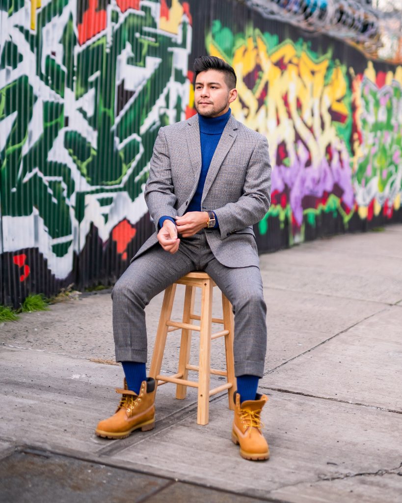 HOW TO PAIR UP YOUR TIMBERLAND BOOTS WITH A SUIT - how to wear timbs with a suit - timberland boots with suit - boots with suit - classic timberland boots - dandy in the bronx - marc darcy suit - turtleneck with suit - blue turtle neck - dapper timberland boots -