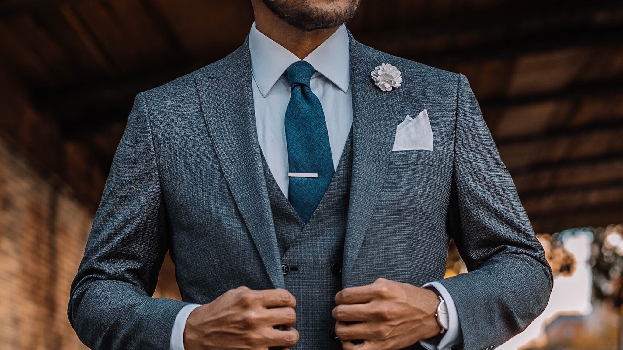 Grey three piece suit - sayki suit - blue ties.com tie - white lapel flower - white shirt style - liberty shirt co - tie bar - dandy in the bronx