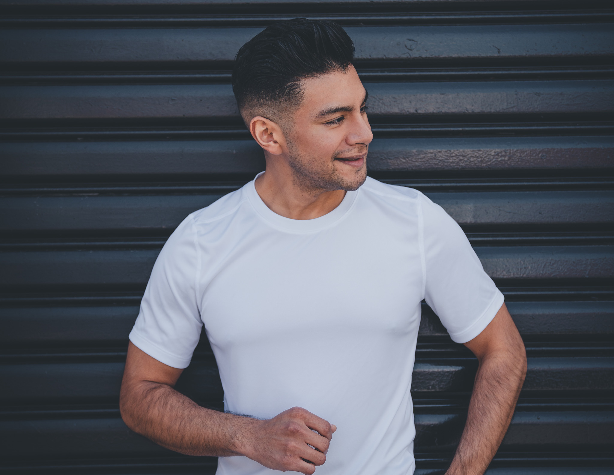 Latino man in white t shirt - smiling man - dandy in the Bronx