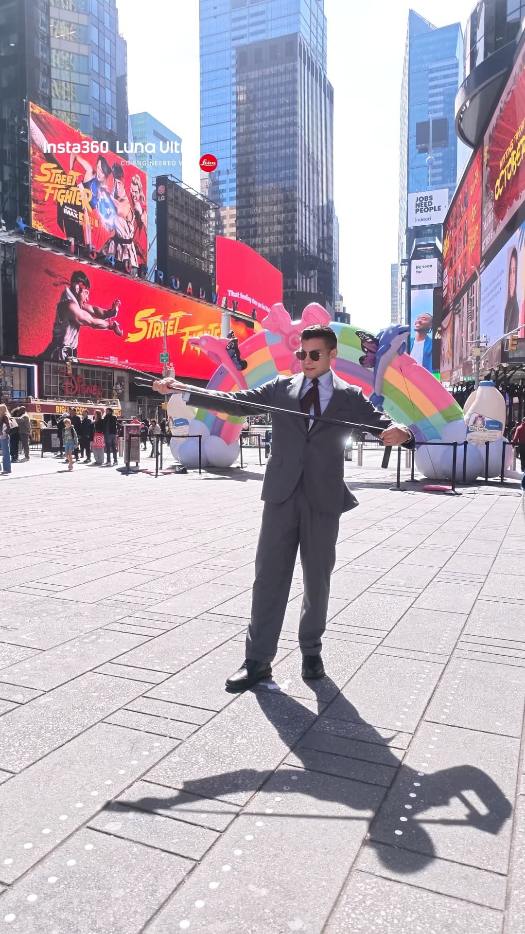 Diego Leon holding the extended Insta360 bullet time stick in Times Square